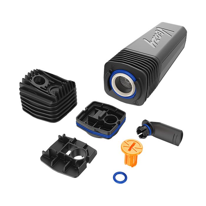 Exploded view of a black portable herbal vaporizer, displaying its main body, cooling unit, mouthpiece, and various internal components with blue seals and an orange tool.
