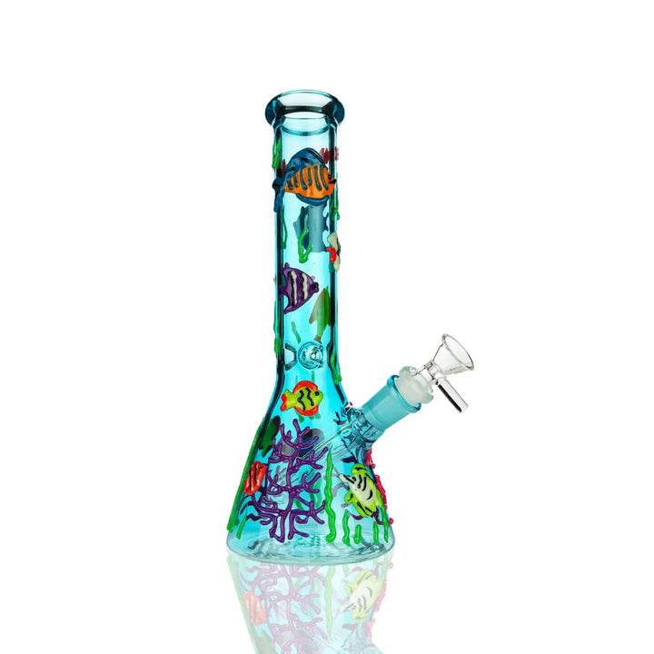 Close-up of a light blue glass beaker water pipe, adorned with colorful 3D raised glass fish and coral reef decorations, showcasing the intricate underwater theme from the base to the neck.