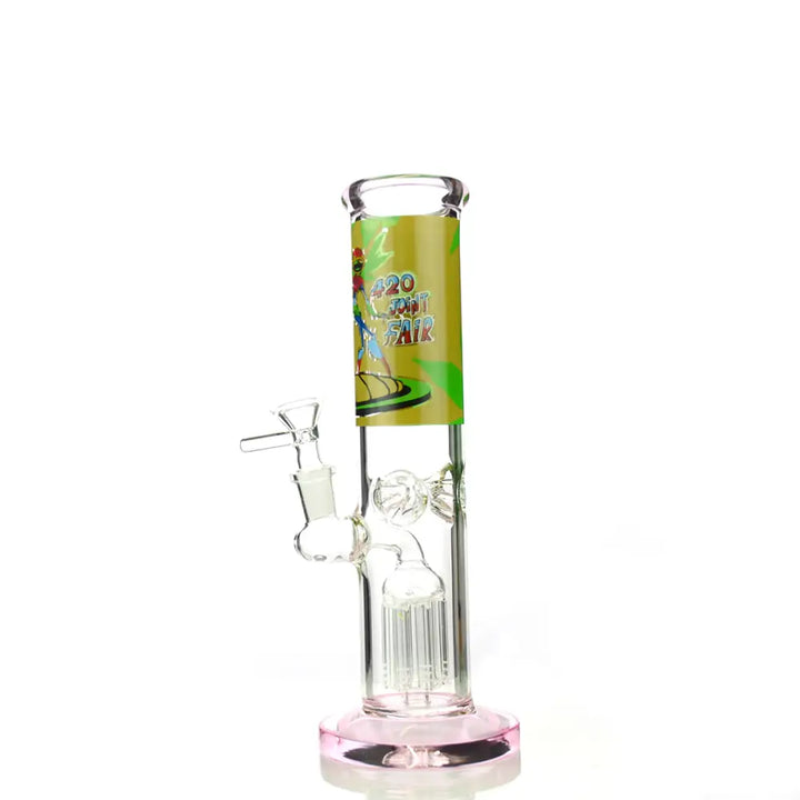 A 10-inch clear glass straight tube water pipe with a pink base and a green and yellow '420 SPOT FAIR' label, featuring a tree percolator and a 14mm male bowl.