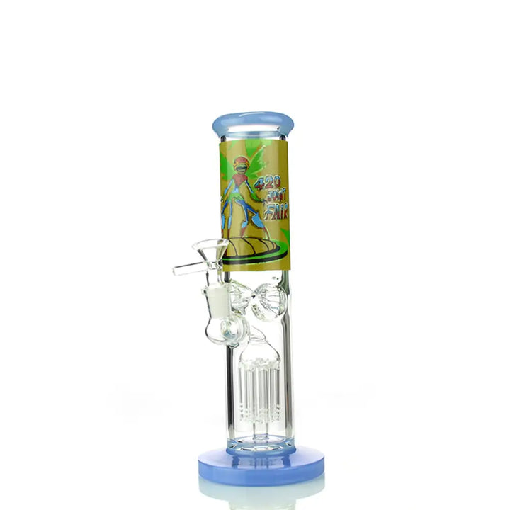 A clear glass straight tube water pipe with a light blue base and mouthpiece, featuring a yellow and green graphic on the neck that reads '420 SMOKE FAIR' with cartoon figures. A clear glass percolator is visible inside, and a 14mm male bowl is attached to the side.