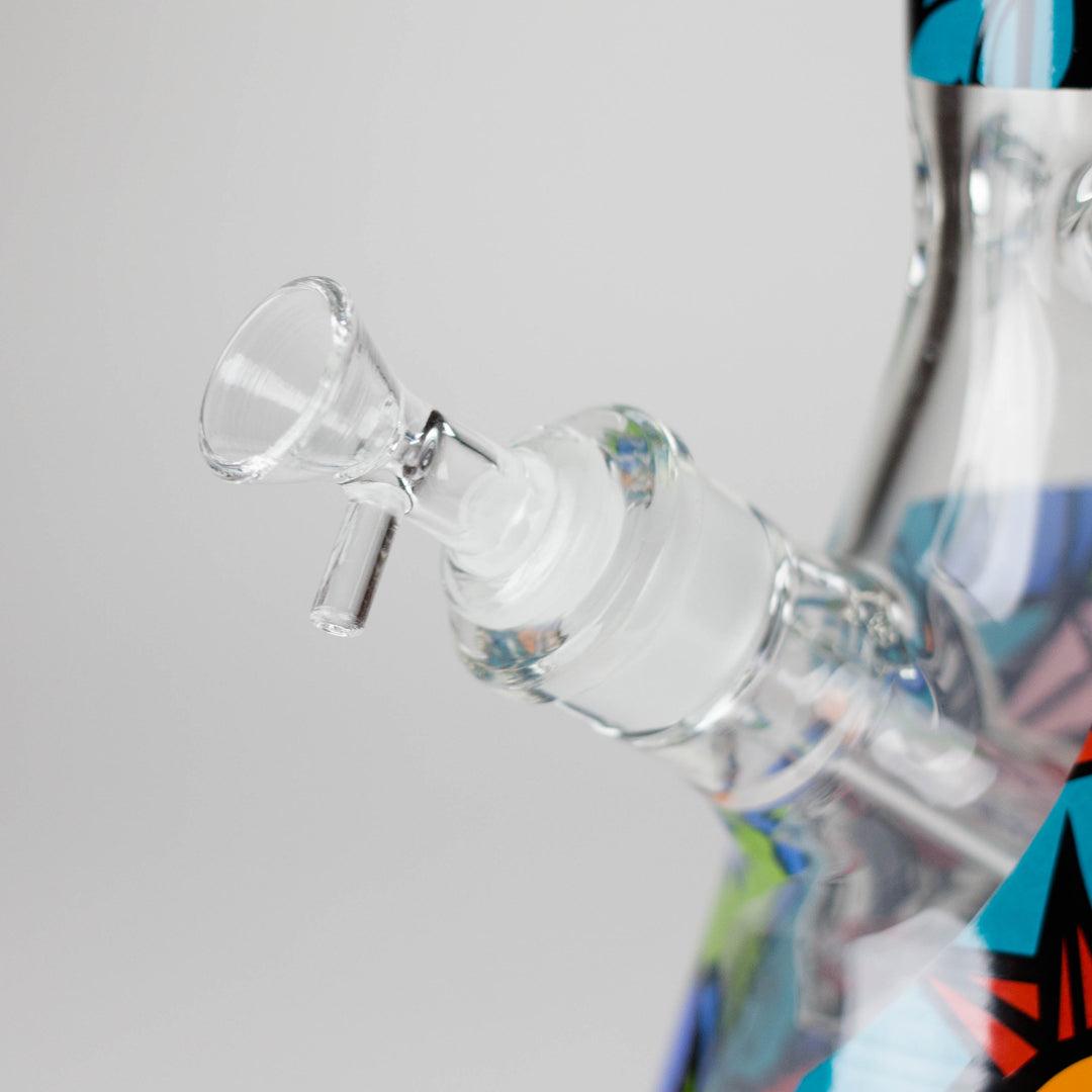 Close-up view of a clear glass bowl with a frosted male joint and a rounded amber-colored rim, featuring a small clear glass handle on the side.