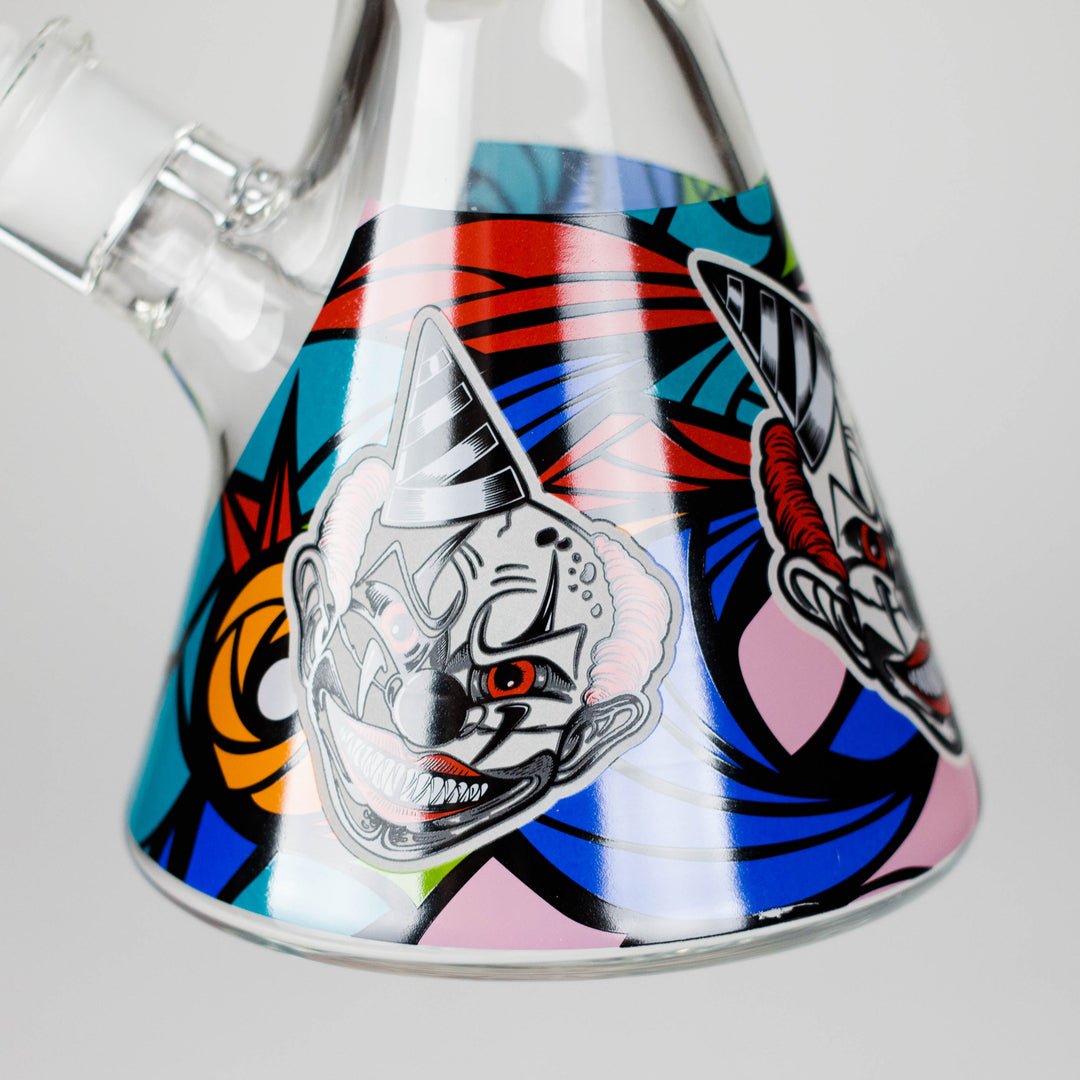 A clear glass beaker water pipe with vibrant blue accents on the mouthpiece, joint, and base, presented against a clean white background.