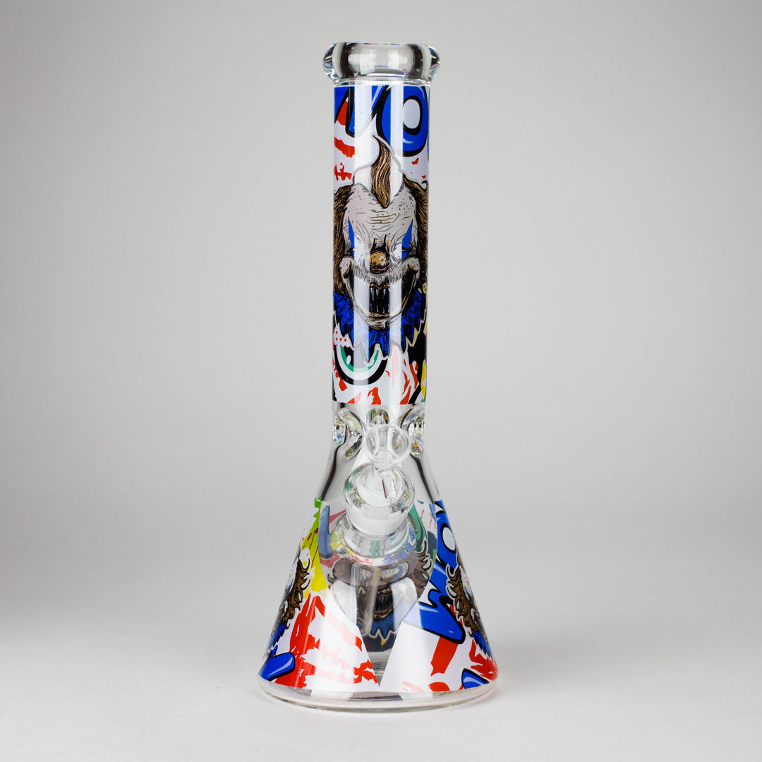 Close-up of a black retail box for a silicone rocket-shaped water pipe, featuring red, green, and yellow tie-dye colors, with a cannabis leaf logo on the front.