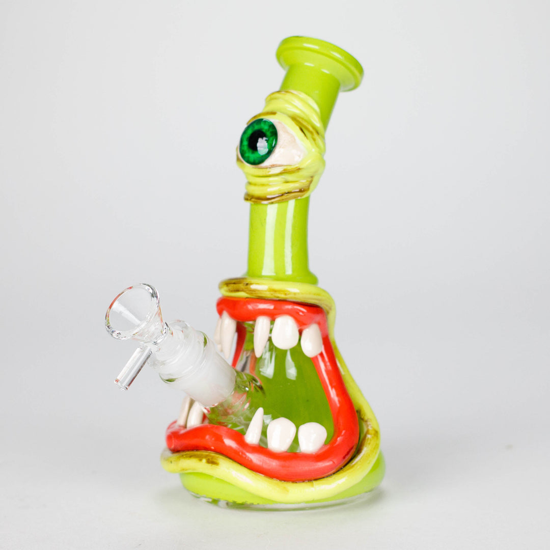 A whimsical glass hand pipe shaped like a cluster of red and white polka-dotted mushrooms growing from a brown tree stump, adorned with small red ladybugs.