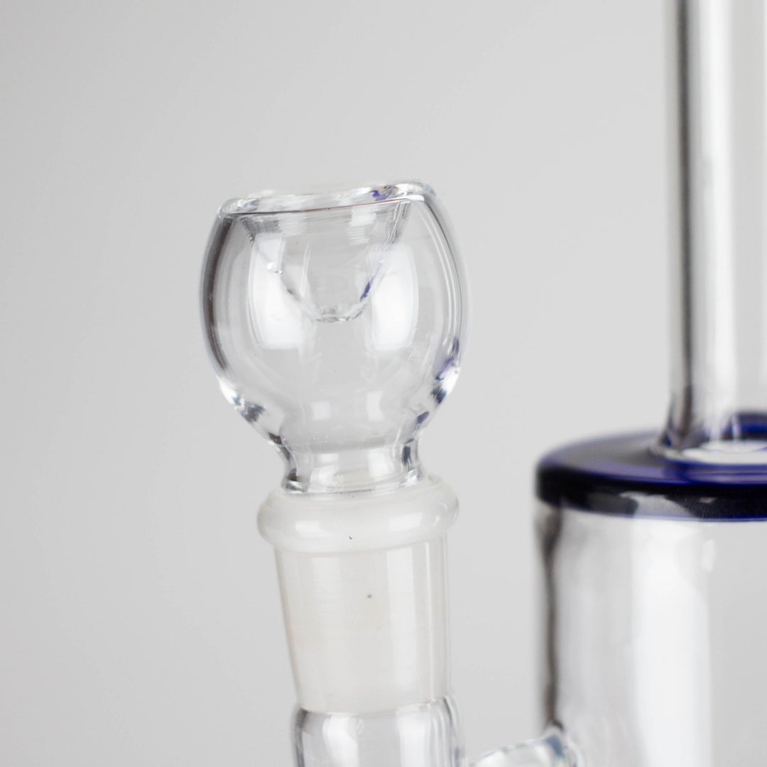 A full view of a clear glass beaker-style water pipe featuring colorful Rick and Morty cartoon characters and red cannabis leaf designs, with a light blue neck.