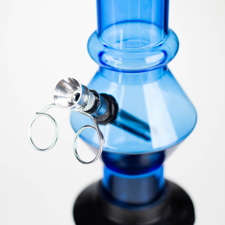 Close-up detail shot of a clear glass funnel-shaped bowl, designed to fit a 14mm male joint, inserted into a bright green silicone adapter.