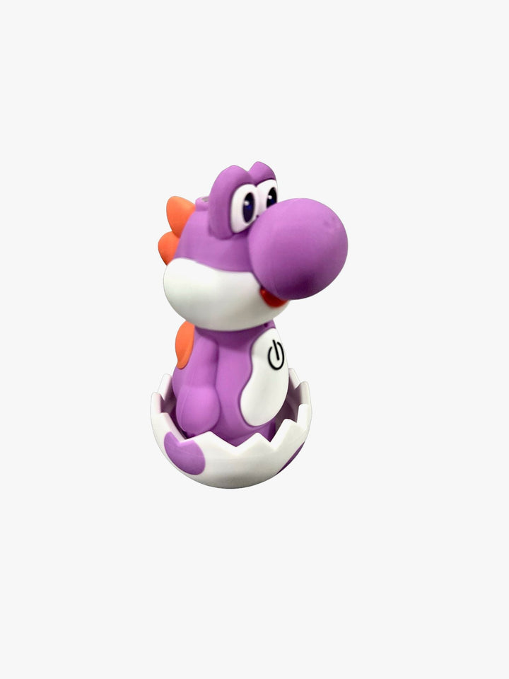 A purple Yoshi-like dinosaur character with orange spikes and a power symbol on its belly, emerging from a white and purple spotted eggshell.