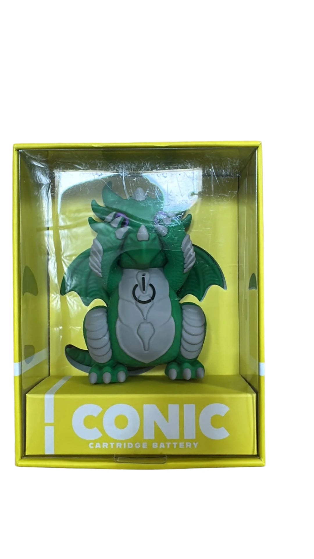 Green dragon-shaped vape battery with light grey accents, displayed in a yellow and clear plastic retail box.