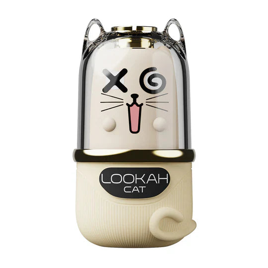 Front view of a cream-colored cat-shaped 510 cartridge battery with a clear top, featuring a playful cat face design and a small tail detail.