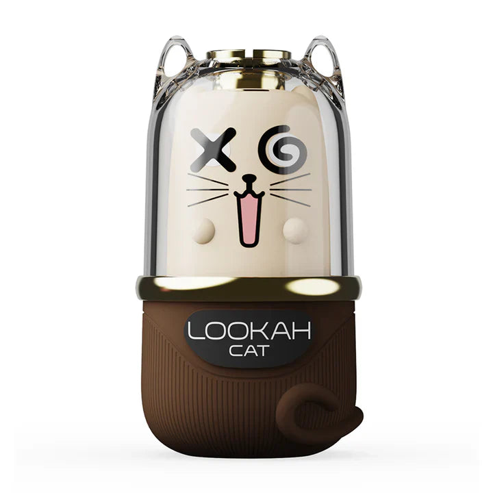 Front view of a cat-shaped 510 cartridge battery with a clear top, cream face, and brown body, featuring a playful cat expression.