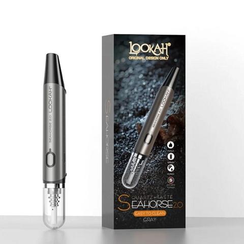 A gray Lookah Seahorse 2.0 concentrate collector vaporizer stands upright next to its matching retail packaging box, showcasing the device and its branding.
