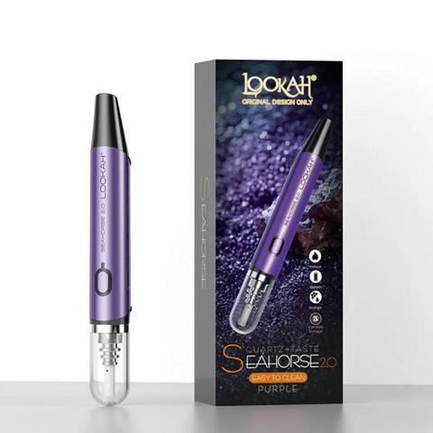 A purple Lookah Seahorse 2.0 concentrate collector vaporizer pen stands upright next to its retail packaging, which features the same device against a sparkly purple background. This is image #11, showcasing the product and its box.