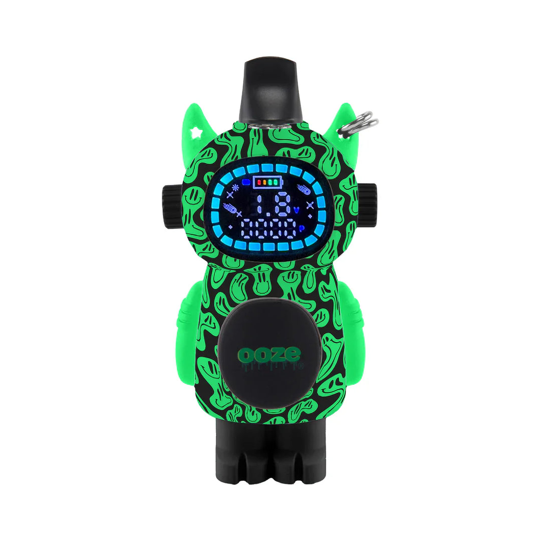 Front view of a green and black vape battery shaped like a small robot or character, featuring a digital display and a swirly pattern with subtle smiley faces.