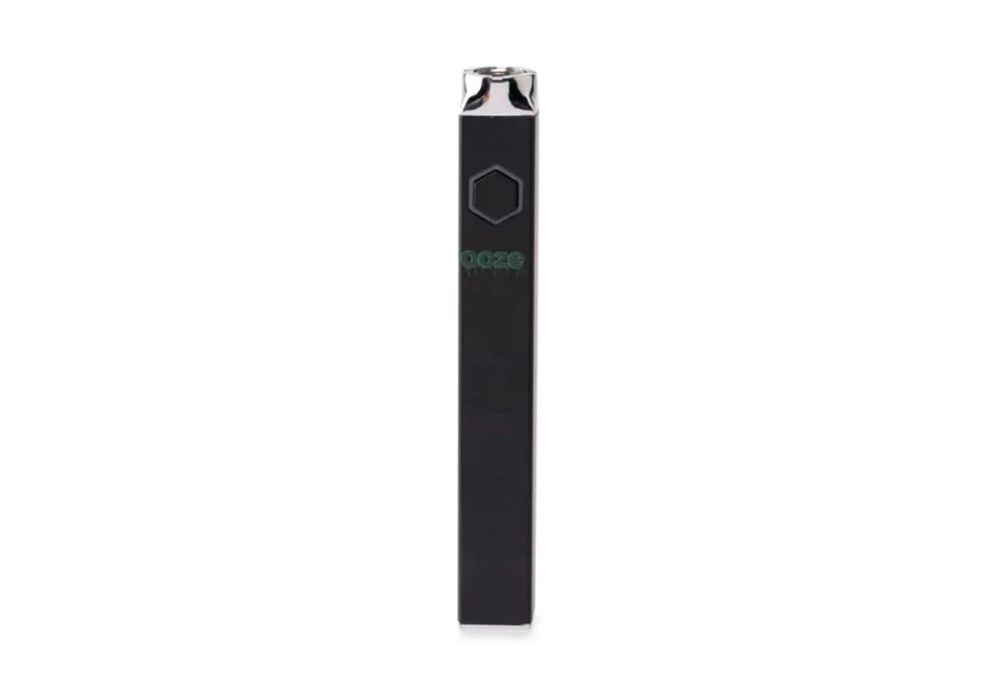 A sleek, black, rectangular vaporizer battery with a silver top and a hexagonal black button, featuring a green 'Ooze' logo on its side, presented against a clean white background.