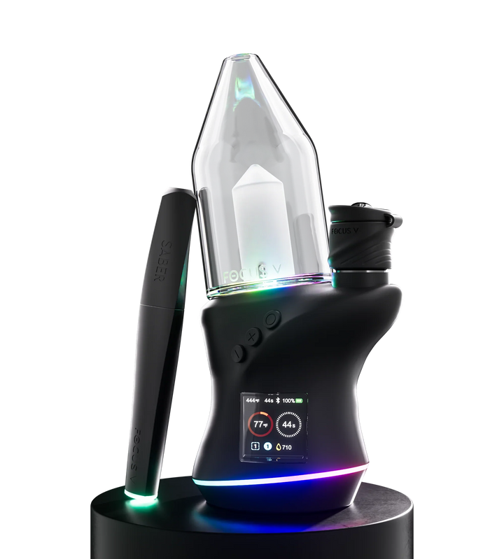 An open glass jar with a blue and black hexagonal silicone sleeve, with its matching lid placed next to it, shown against a white background.