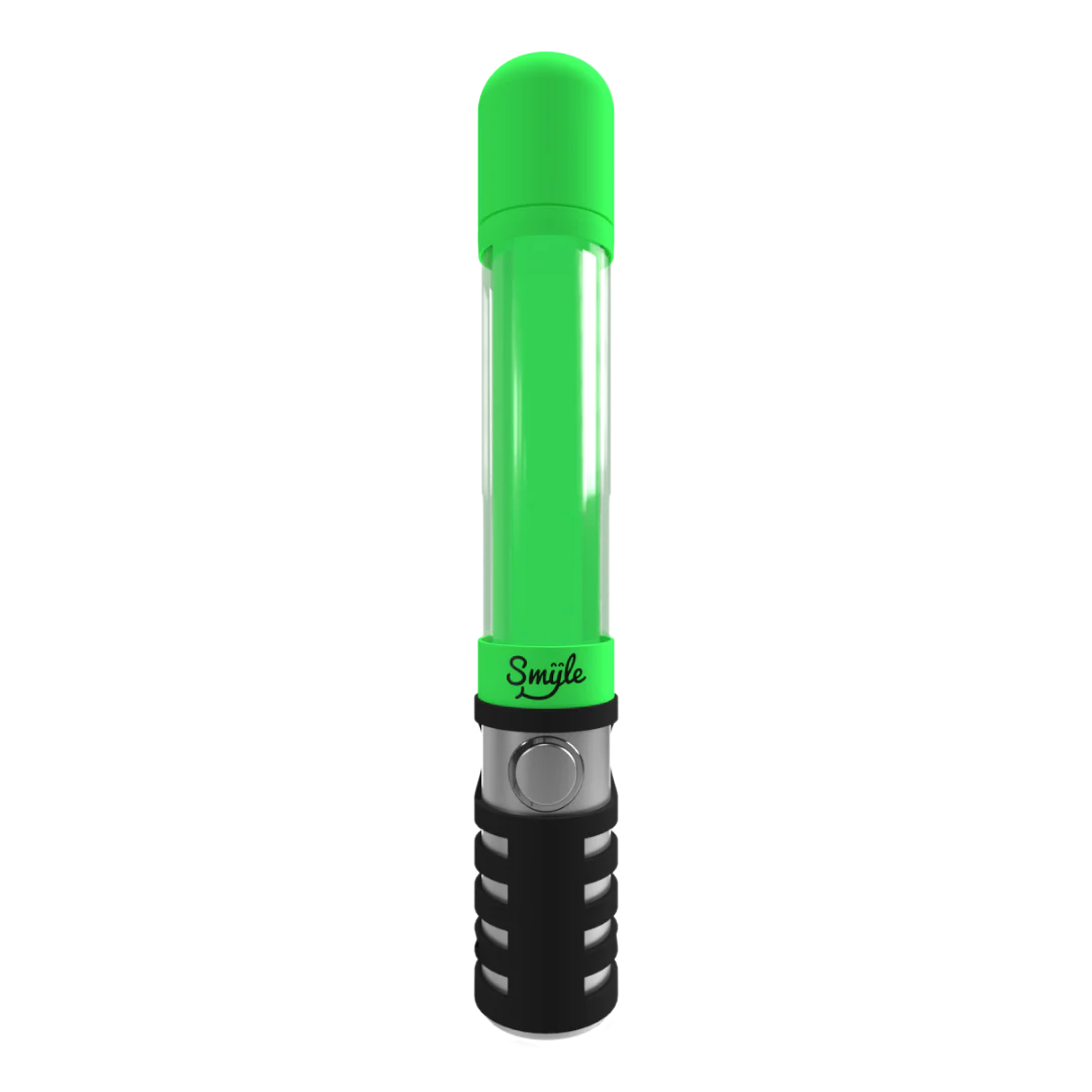 Close-up detail shot of the clear glass beaker base and downstem of a water pipe, showing a black logo on the downstem.