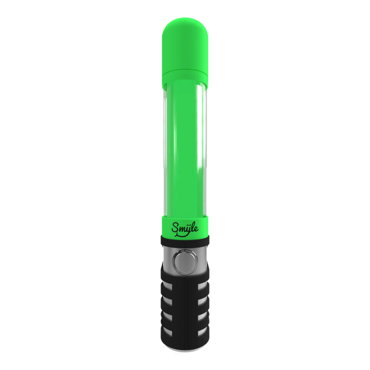 Close-up detail shot of the clear glass beaker base and downstem of a water pipe, showing a black logo on the downstem.