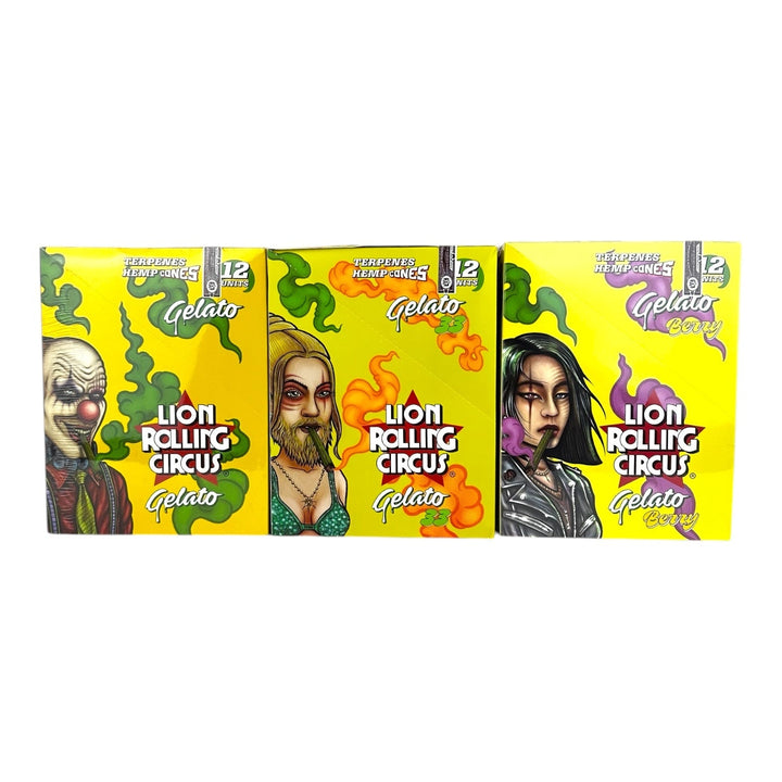 Three yellow boxes of Lion Rolling Circus hemp cones, each featuring a different illustrated character: a clown, a bearded woman, and a woman with dark hair, all surrounded by smoke-like patterns.