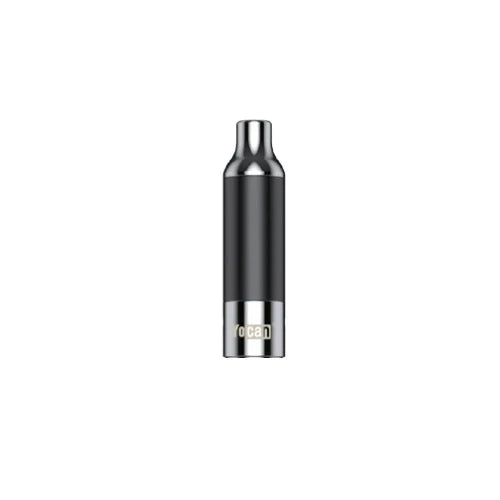 A small, cylindrical, two-toned metal vape atomizer, featuring a silver top and bottom with a black mid-section, and a 'Yocan' logo at the base.