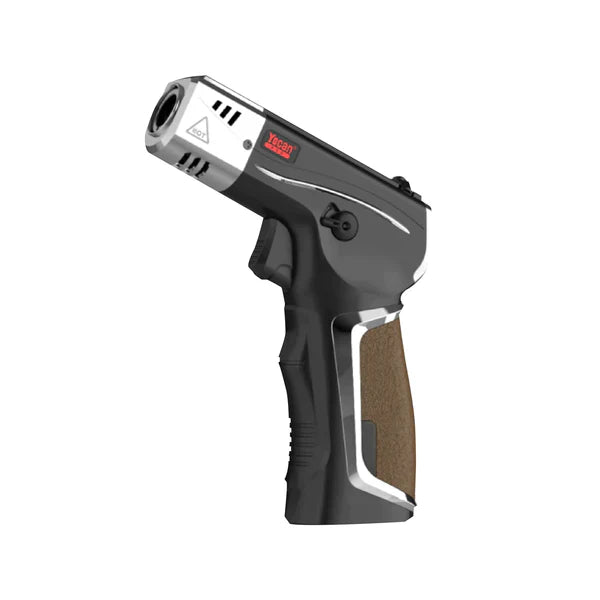 Angled view of a dark grey and silver Yocan Red BEEF Butane Torch with a brown textured grip, showing the nozzle and branding.