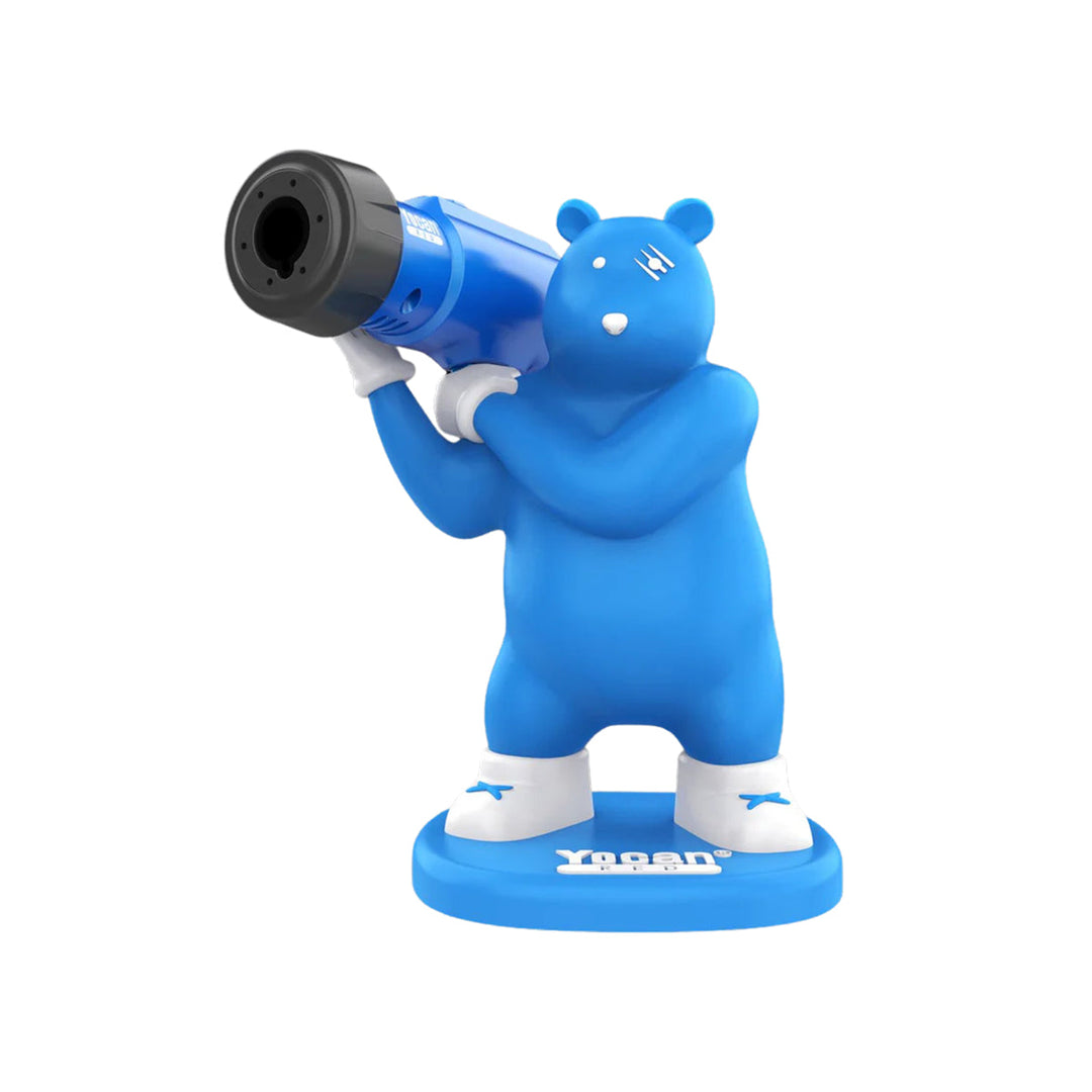 Full view of a blue bear-shaped torch holder with a blue high-output torch, standing on a round base.