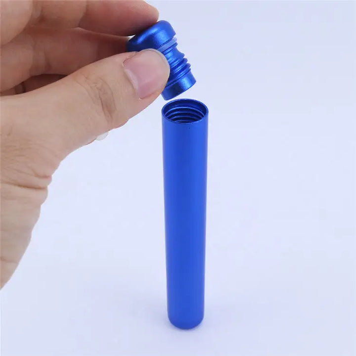 A hand holds the threaded blue aluminum cap above a matching blue aluminum tube, showing the internal threading of both parts.