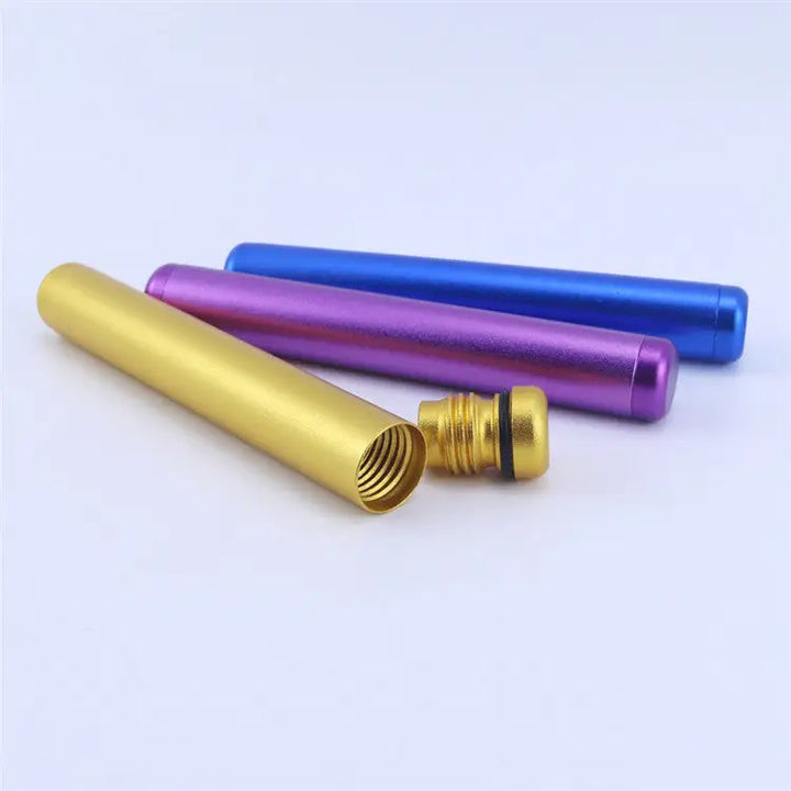 Three cylindrical aluminum tubes in gold, purple, and blue, with the gold tube open to show its threaded cap and interior.