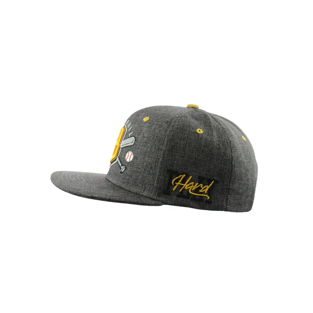 Side view of a grey baseball cap with a flat brim, featuring yellow embroidered baseball-themed logo and script text.