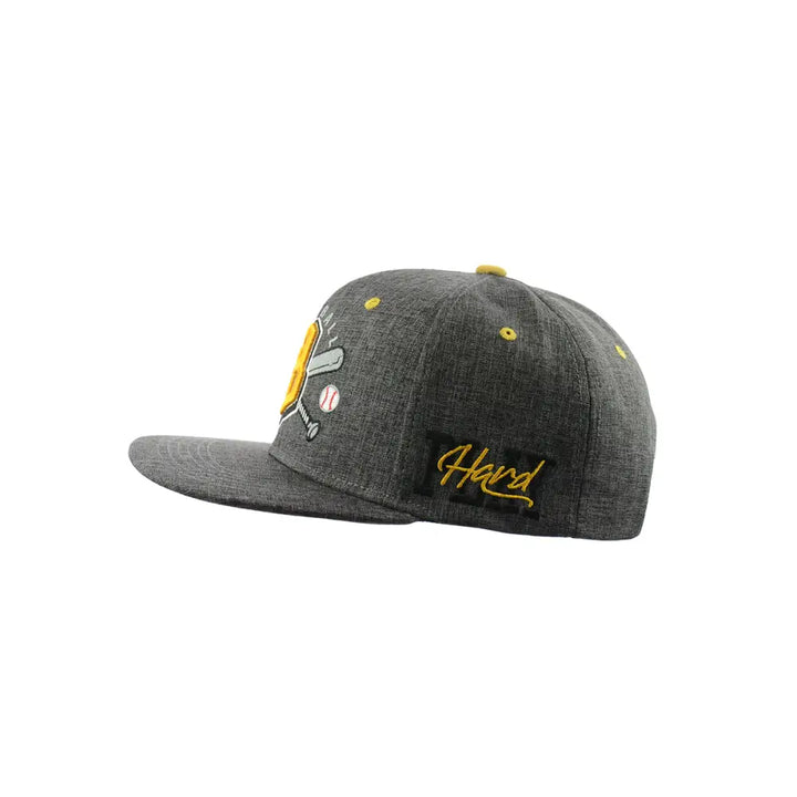 Side view of a grey baseball cap with a flat brim, featuring yellow embroidered baseball-themed logo and script text.