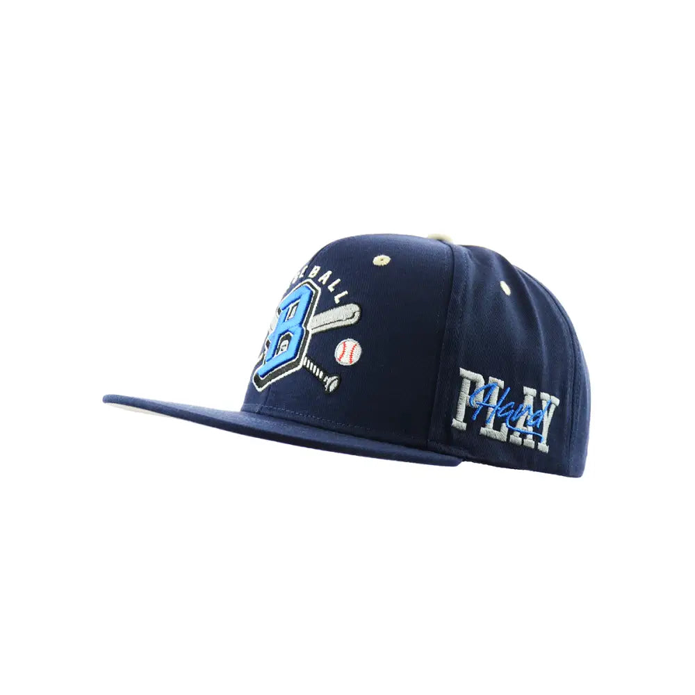 Side view of a navy blue baseball cap featuring a light blue and white embroidered baseball-themed logo on the front panel and 'PLAY' embroidered on the side.