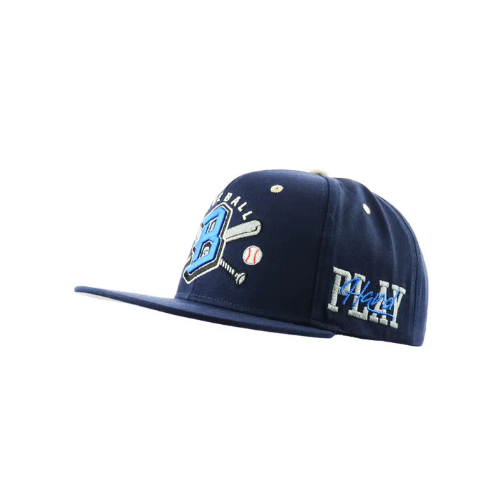 Side view of a navy blue baseball cap featuring a light blue and white embroidered baseball-themed logo on the front panel and 'PLAY' embroidered on the side.