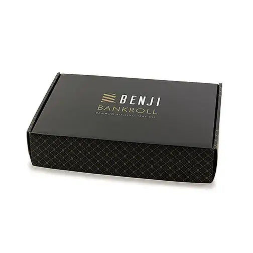 Black rectangular box packaging for a rolling kit, featuring a gold logo and text, with a subtle geometric pattern on the sides, presented on a white background.