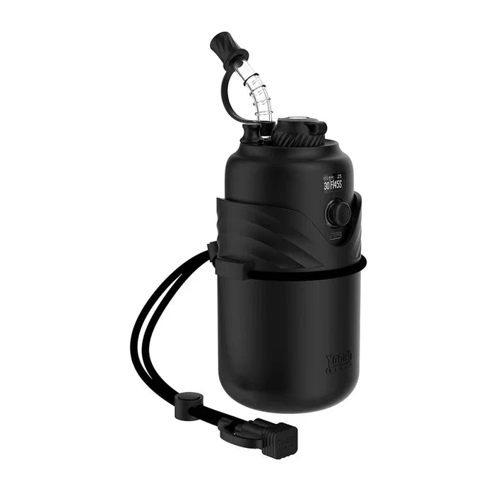 A clear glass beaker water pipe featuring a prominent yellow skull with black eyes, surrounded by red roses and black and silver vine-like artwork, set against a plain white background.