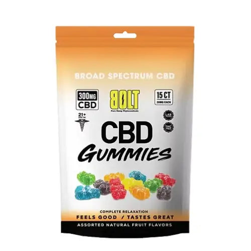 A white and orange stand-up pouch of Bolt CBD Gummies with colorful gummy candies visible through a clear window.