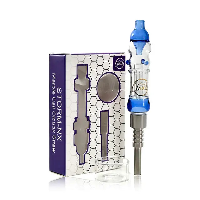 A blue and clear glass nectar collector with a metal tip, displayed next to its purple and white retail packaging featuring a honeycomb pattern. This image shows the product and its box.