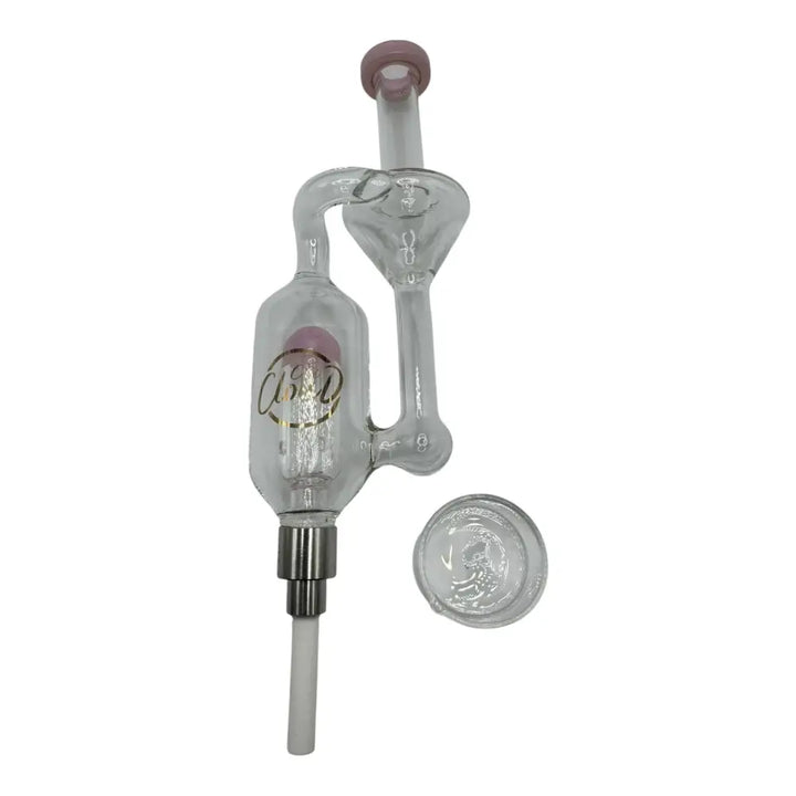 A clear glass nectar collector with a pink mouthpiece and internal component, featuring a gold logo on the main chamber, shown alongside a small clear glass dish.