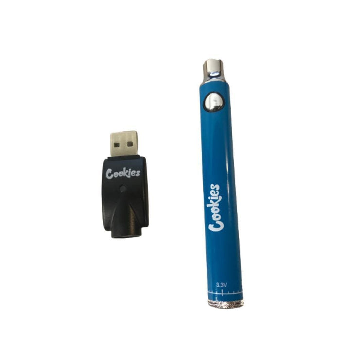 A blue cylindrical vape pen battery with a silver tip and a black USB charger, both featuring the white 'Cookies' brand logo, displayed against a white background.