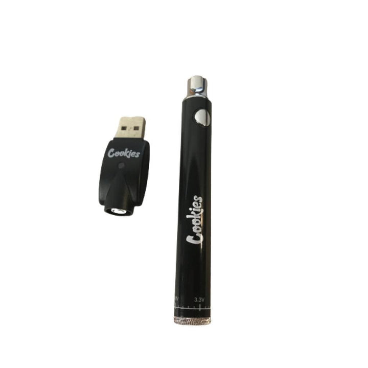 Black cylindrical vape pen battery with a silver tip and 'Cookies' logo, shown next to a black USB charger with the same 'Cookies' branding, both against a white background.