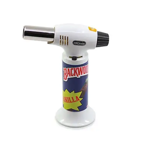 A white and blue torch lighter with a silver nozzle, featuring 'BACKWOODS' and 'VANILLA' branding on its cylindrical base, shown against a white background.