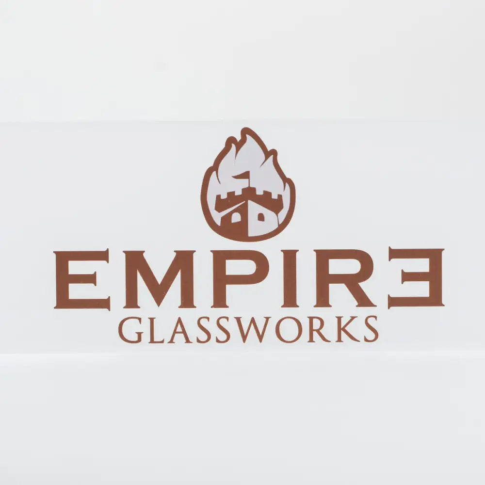 Close-up of the Empire Glassworks logo, featuring a brown castle icon with flames above it, and the words 'EMPIRE GLASSWORKS' in brown text below, all on a white background.