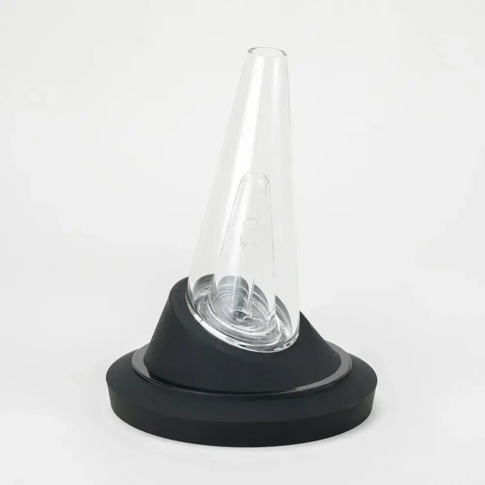 A black display stand with a clear, conical glass vaporizer attachment sitting upright on it, against a white background.