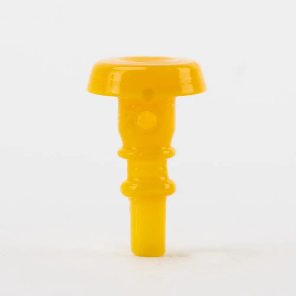 A small, translucent, bright yellow T-shaped accessory with a flat, wide top and a stepped, cylindrical stem, shown against a white background.
