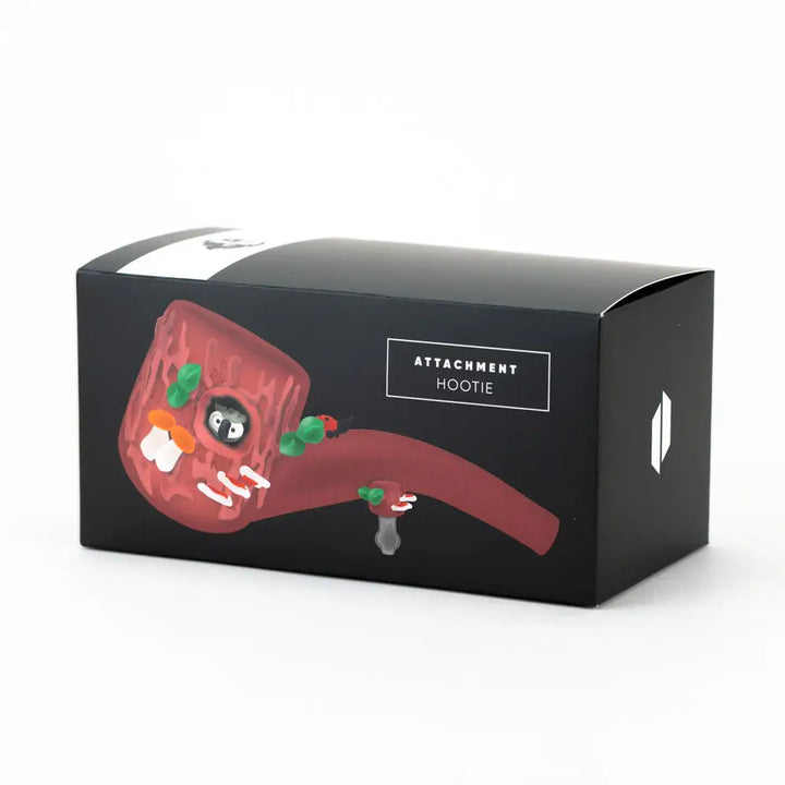 Close-up shot of a black product box featuring a red, owl-themed glass pipe design on the front, presented against a clean white background.