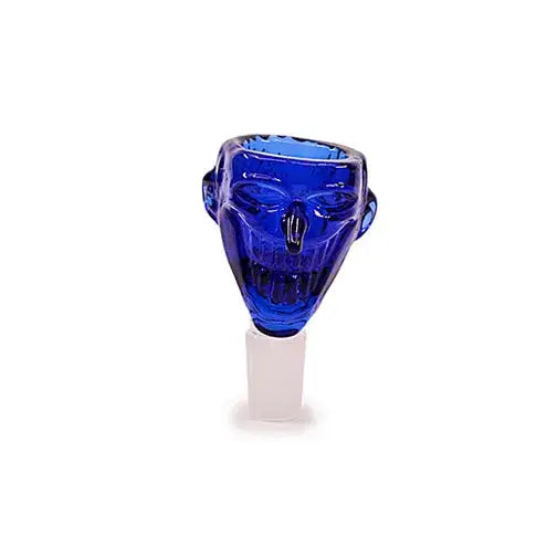 Close-up studio shot of a vibrant blue glass smoking bowl, shaped like a grinning skull, with a clear male joint connector at the bottom, set against a plain white background.