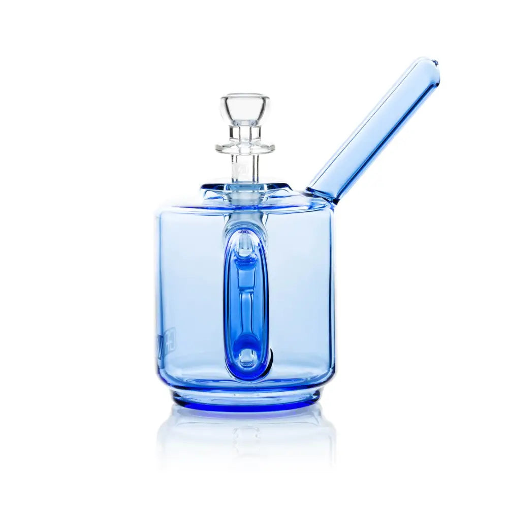 Close-up detail of a clear glass funnel-shaped bowl with a small handle, inserted into a frosted glass joint on a water pipe.