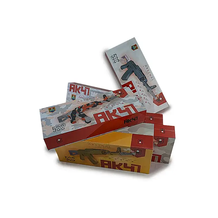 Multiple retail boxes for a gun-shaped electric nectar collector kit, stacked and fanned out, featuring AK47 branding and camouflage patterns on a white background.