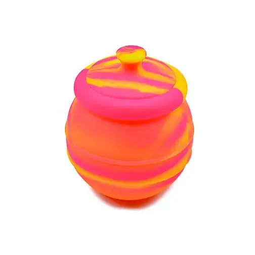 A vibrant, swirled pink and yellow silicone container shaped like a small pot with a lid, shown against a white background.