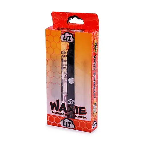 Close-up of the retail packaging for a portable wax vaporizer, featuring a clear window displaying the black pen-style device inside. The box is predominantly orange and yellow with a honeycomb pattern.