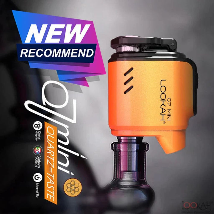 A vibrant orange and black Lookah Q7 Mini e-nail dabber is prominently displayed, attached to a dark glass water pipe base. A 'NEW RECOMMEND' banner overlays the top left, with feature icons like 'Digital display', 'Variable Voltage', and 'Magnet Tip' listed vertically.