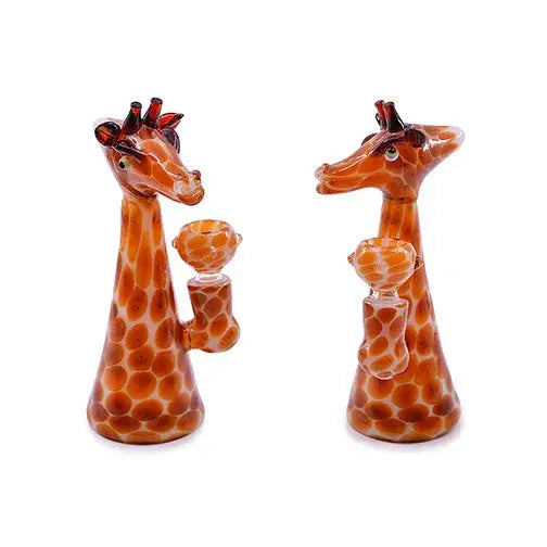 Two identical giraffe-shaped glass bubblers with orange and white spotted patterns, shown from slightly different angles on a white background.